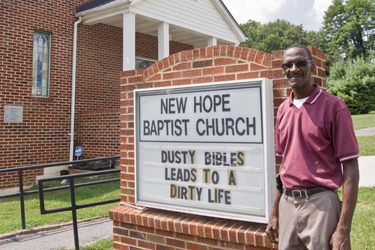 dusty bibles reid front of church